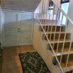 14.- Casa Tomas - Stairs and storage area